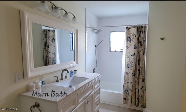 full bathroom featuring vanity and shower / bath combination with curtain