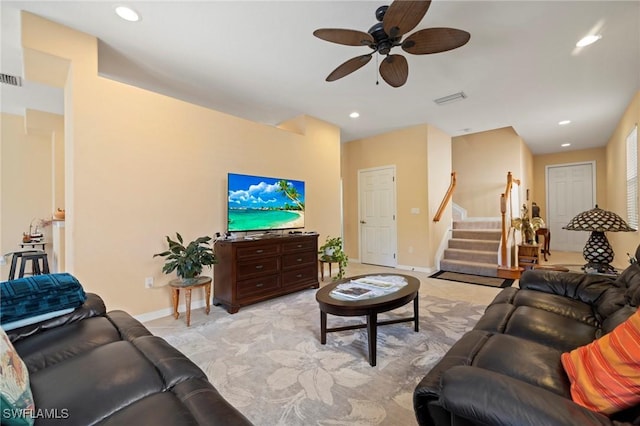 living room featuring visible vents, a ceiling fan, recessed lighting, stairway, and baseboards