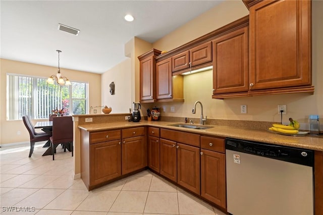 kitchen with a sink, a notable chandelier, stainless steel dishwasher, and brown cabinetry