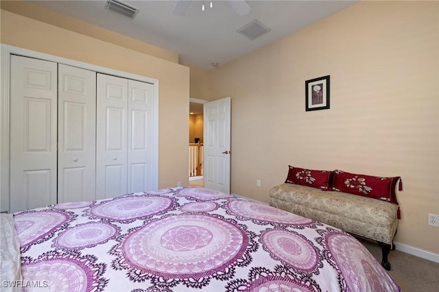 bedroom featuring visible vents, a closet, carpet floors, baseboards, and ceiling fan