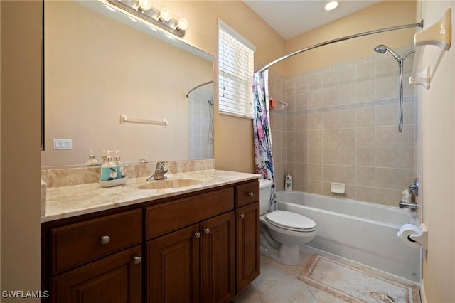 full bath featuring tile patterned flooring, toilet, vanity, and shower / bath combo