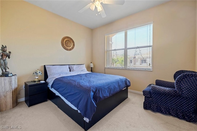 bedroom featuring baseboards, carpet, and a ceiling fan