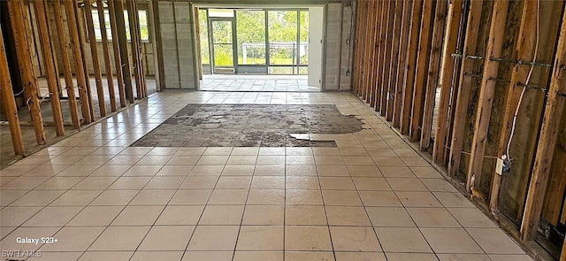 interior space featuring tile patterned flooring