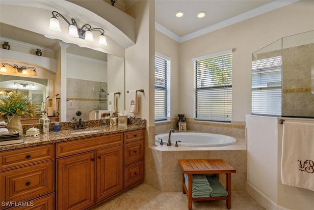 bathroom with vanity, a garden tub, tiled shower, tile patterned flooring, and crown molding