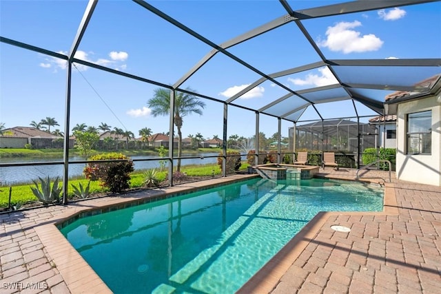 view of swimming pool with glass enclosure, a patio, a water view, and a pool with connected hot tub