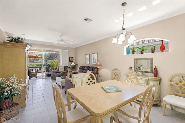 8339 Langshire Way, Fort Myers, FL 33912 - dining space with ceiling fan with notable chandelier, visible vents, crown molding, and light tile patterned flooring