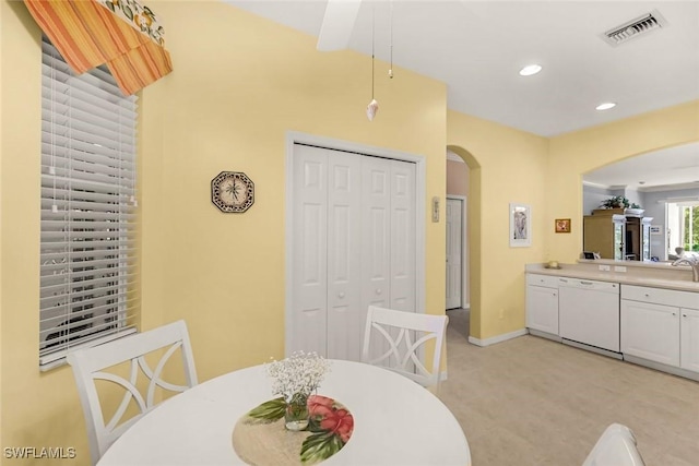 8339 Langshire Way, Fort Myers, FL 33912 - dining area featuring baseboards, visible vents, arched walkways, and recessed lighting