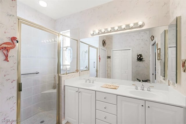 8339 Langshire Way, Fort Myers, FL 33912 - full bathroom with a sink, double vanity, and a stall shower