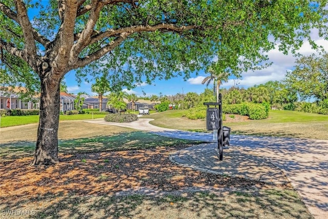 8339 Langshire Way, Fort Myers, FL 33912 - view of home's community featuring a lawn and a residential view
