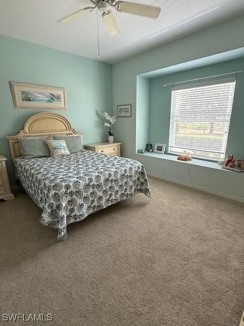 8339 Langshire Way, Fort Myers, FL 33912 - bedroom featuring baseboards, carpet flooring, and ceiling fan