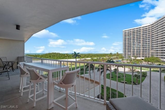 balcony with outdoor dining area