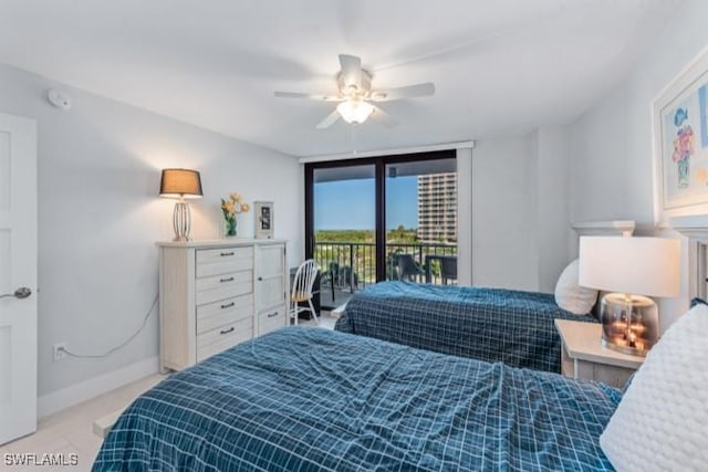 bedroom with a wall of windows, access to outside, baseboards, and ceiling fan