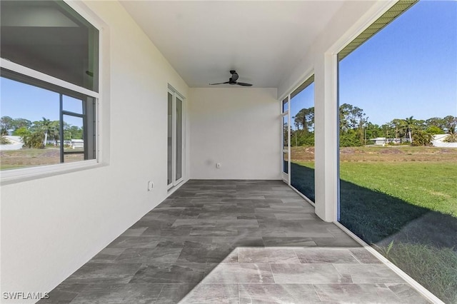 view of patio with ceiling fan