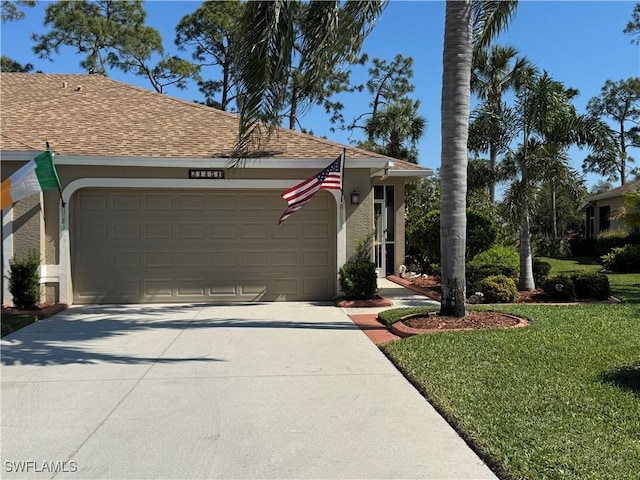 ranch-style house with roof with shingles, an attached garage, driveway, and stucco siding