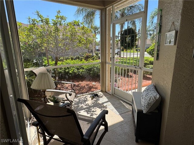 sunroom / solarium with a healthy amount of sunlight