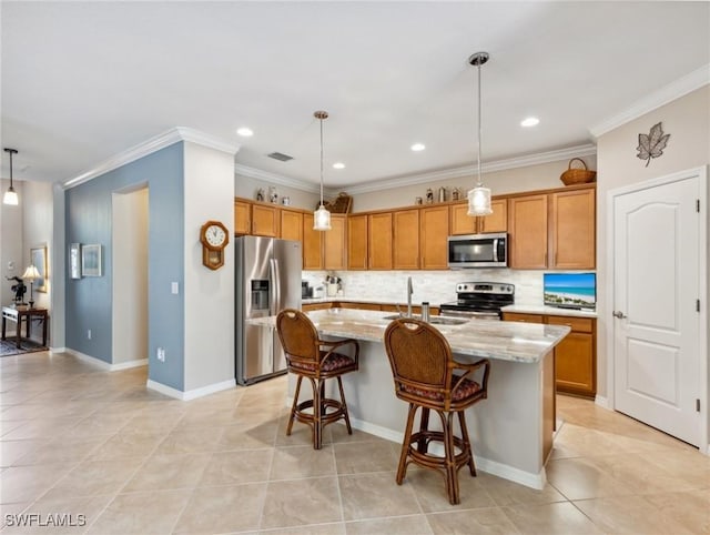 13117 Cardeto Ct, Estero, FL 33928 - kitchen featuring tasteful backsplash, light stone counters, brown cabinets, stainless steel appliances, and a sink