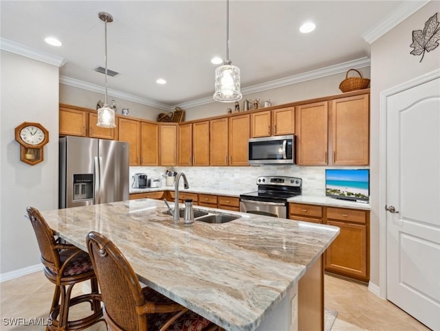 13117 Cardeto Ct, Estero, FL 33928 - kitchen with decorative backsplash, crown molding, appliances with stainless steel finishes, and a sink
