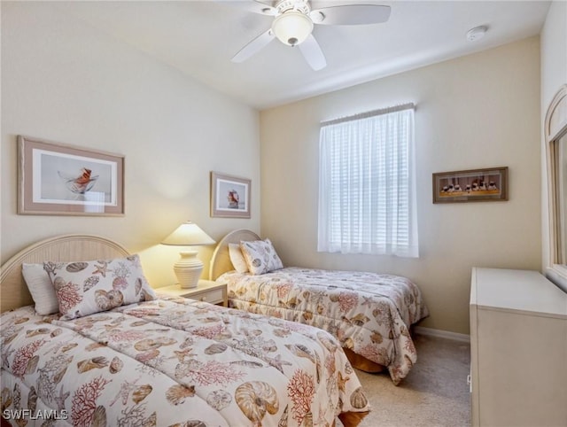 13117 Cardeto Ct, Estero, FL 33928 - carpeted bedroom featuring baseboards and a ceiling fan