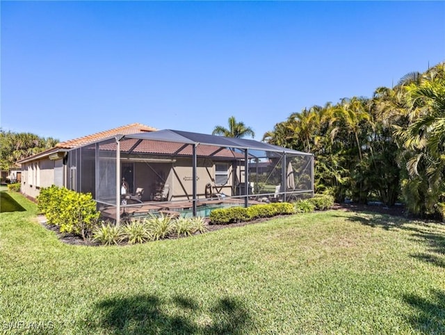 13117 Cardeto Ct, Estero, FL 33928 - view of yard with glass enclosure and an outdoor pool