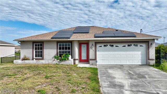 ranch-style house with stucco siding, a garage, roof with shingles, and concrete driveway