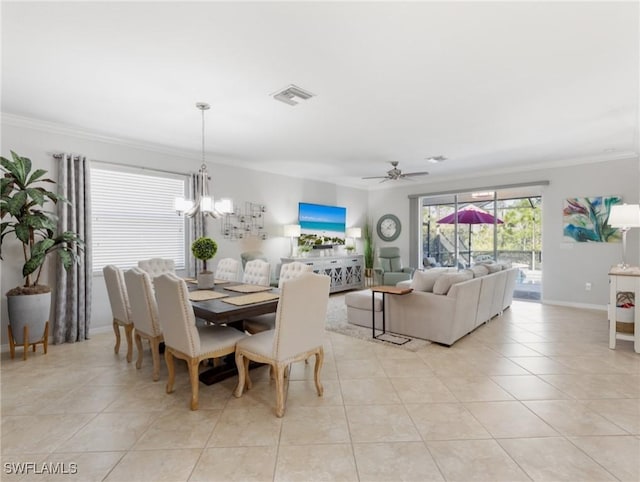 21116 Bella Terra Blvd, Estero, FL 33928 - dining space featuring light tile patterned floors, visible vents, ceiling fan with notable chandelier, and crown molding