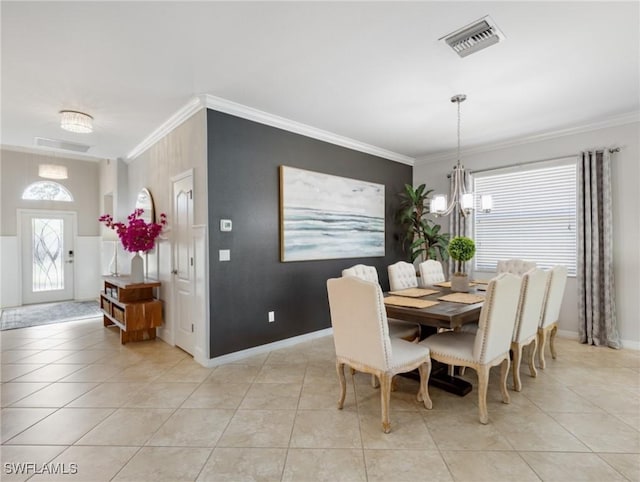 21116 Bella Terra Blvd, Estero, FL 33928 - dining space featuring visible vents, a chandelier, and crown molding