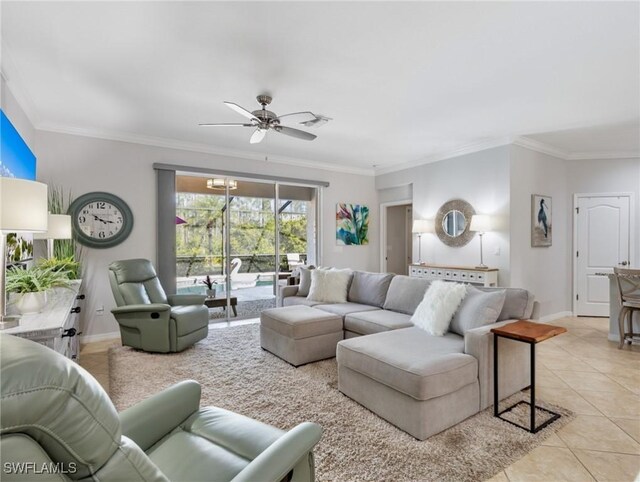 21116 Bella Terra Blvd, Estero, FL 33928 - living area featuring light tile patterned floors, baseboards, ceiling fan, and ornamental molding