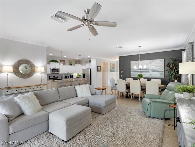 21116 Bella Terra Blvd, Estero, FL 33928 - living room featuring visible vents, crown molding, and ceiling fan with notable chandelier