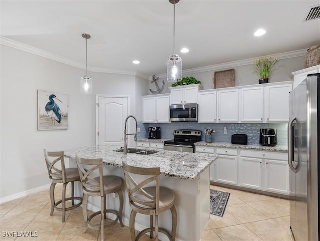 21116 Bella Terra Blvd, Estero, FL 33928 - kitchen featuring crown molding, visible vents, appliances with stainless steel finishes, and a sink