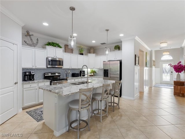 21116 Bella Terra Blvd, Estero, FL 33928 - kitchen with backsplash, crown molding, light tile patterned floors, appliances with stainless steel finishes, and a sink