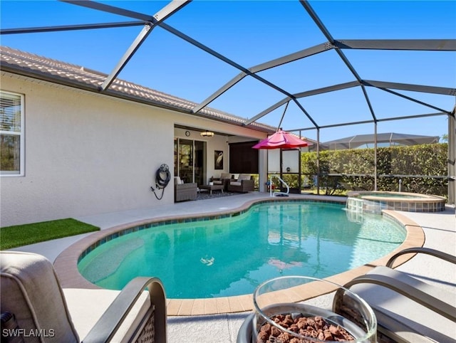 21116 Bella Terra Blvd, Estero, FL 33928 - view of pool featuring a lanai, a pool with connected hot tub, an outdoor living space with a fire pit, and a patio