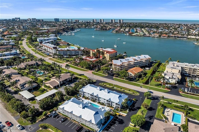 bird's eye view featuring a city view and a water view