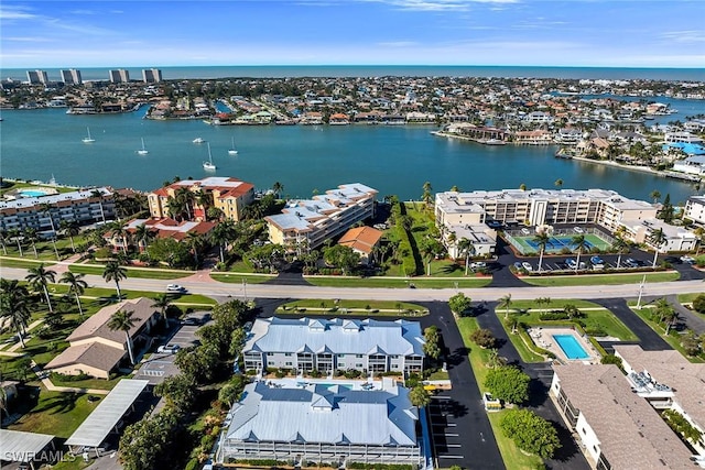 birds eye view of property featuring a water view