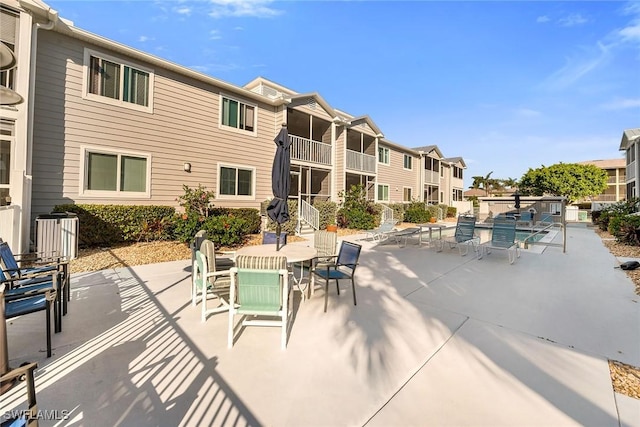 view of patio / terrace with a residential view