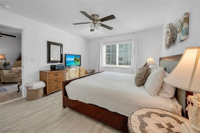 bedroom featuring ceiling fan and light wood-style flooring