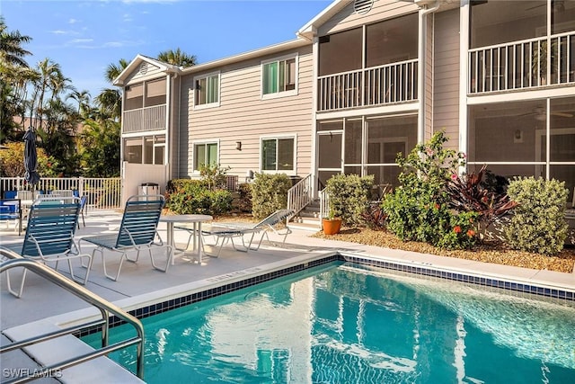 community pool featuring a patio