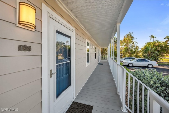 wooden deck with a porch