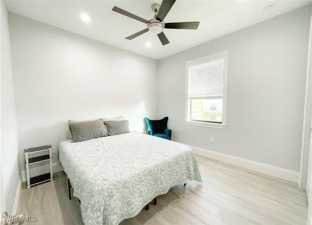 bedroom with light wood-style flooring, recessed lighting, baseboards, and ceiling fan