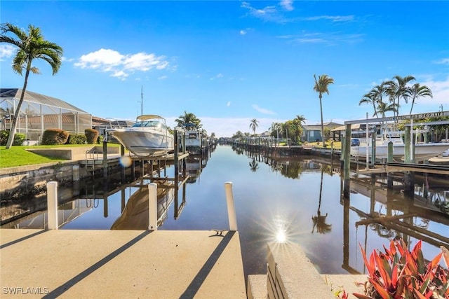 dock area featuring a water view and boat lift