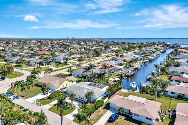 aerial view featuring a residential view and a water view