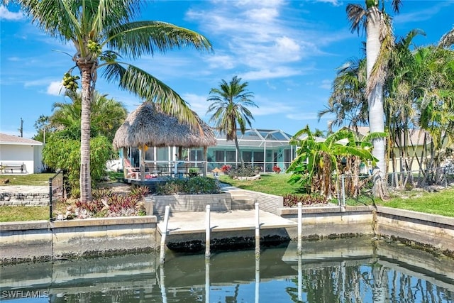 dock area featuring a lanai and a water view