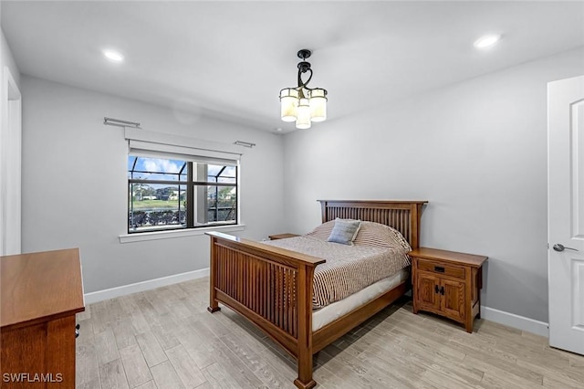 bedroom with recessed lighting, baseboards, and light wood-style floors