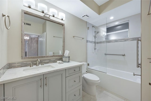 bathroom featuring vanity, toilet, washtub / shower combination, and visible vents