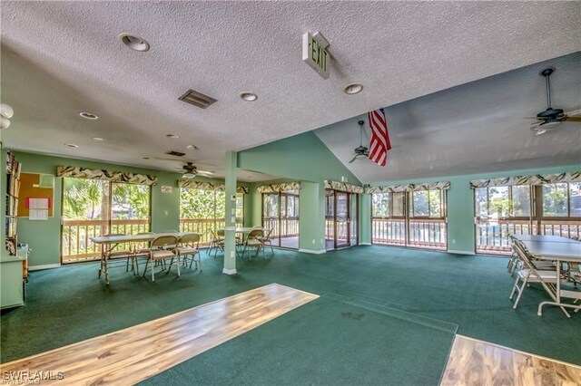 interior space featuring visible vents, outdoor dining area, and a ceiling fan