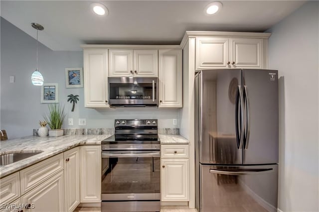 kitchen with light stone countertops, recessed lighting, hanging light fixtures, stainless steel appliances, and a sink