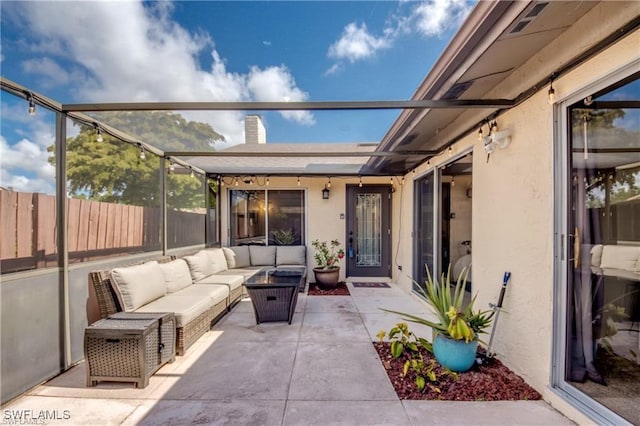 view of patio with outdoor lounge area, a fenced backyard, and visible vents