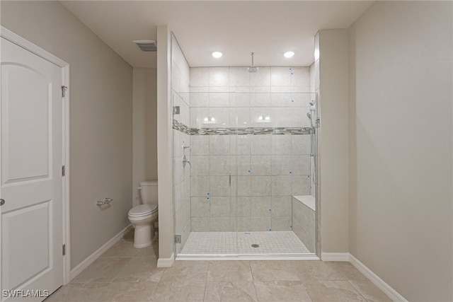 bathroom featuring visible vents, a shower stall, baseboards, toilet, and recessed lighting