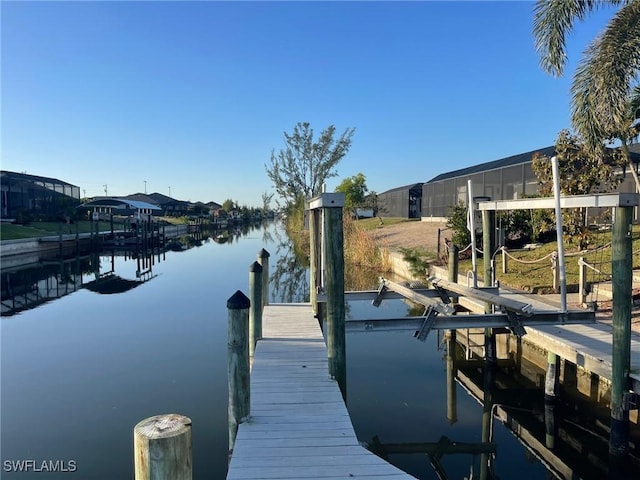 dock area with a water view