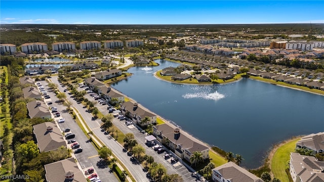 aerial view featuring a water view and a residential view