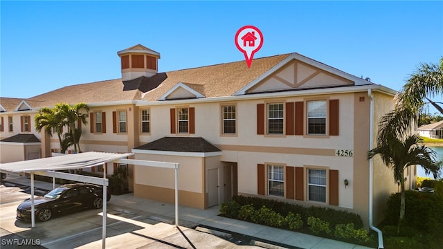 view of property with stucco siding